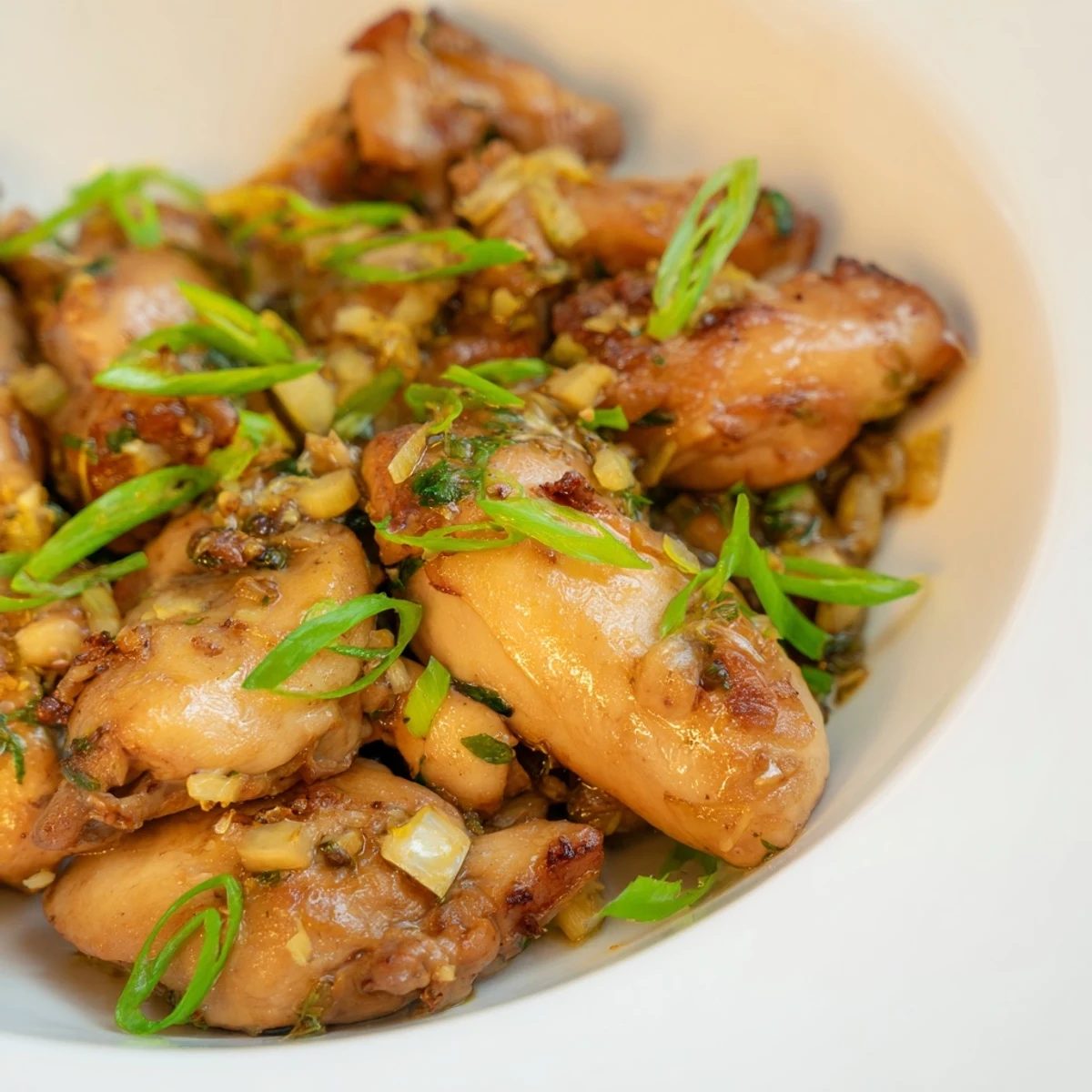 Tender Vietnamese Lemongrass Chicken served over fluffy jasmine rice with crisp cucumber slices and bright lime wedges for zest.