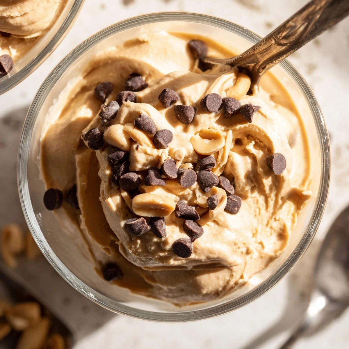 Light and fluffy peanut butter and Cool Whip mousse with chocolate shaving garnish