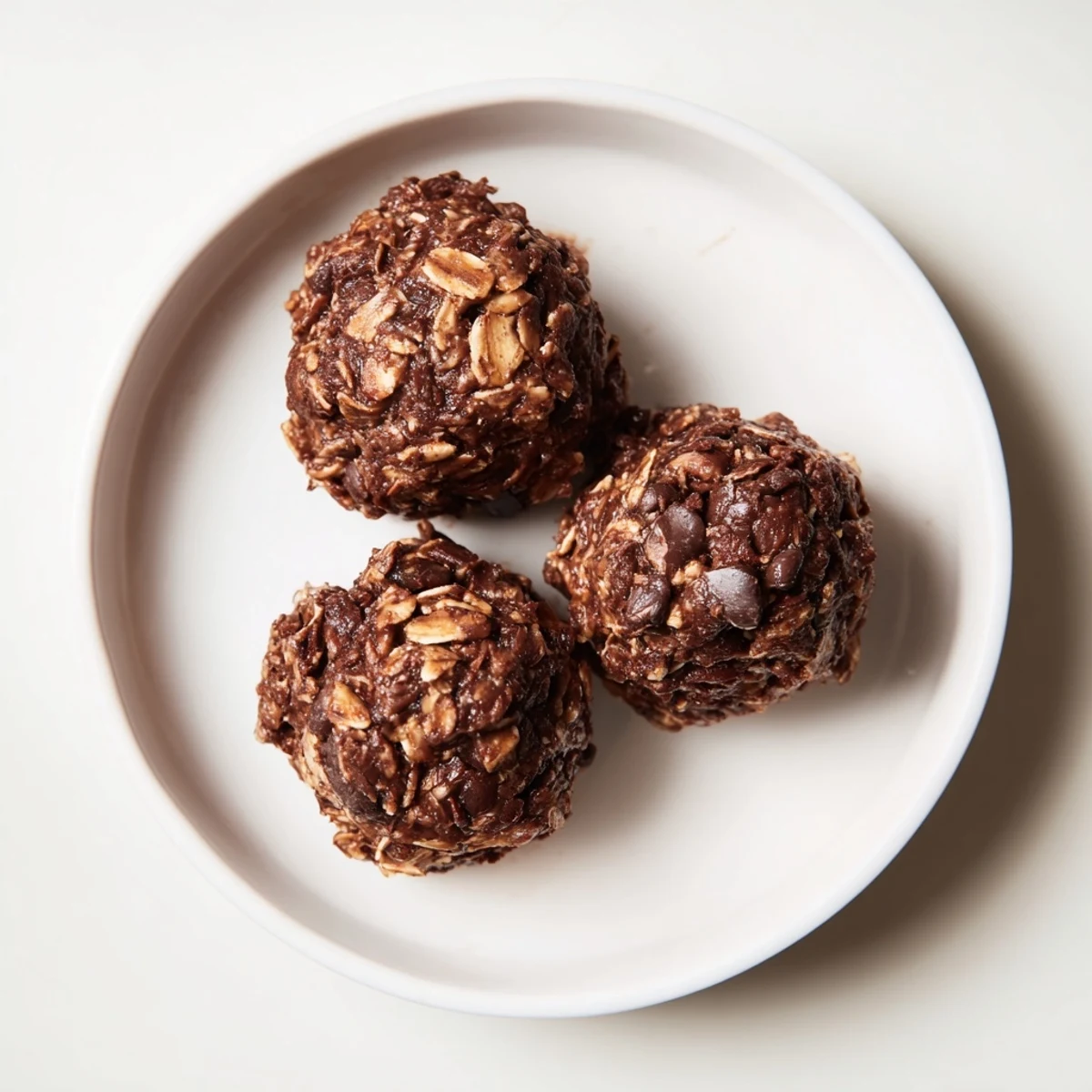 Chilled Brownie Protein Bites on a plate, nutty aroma and dense texture