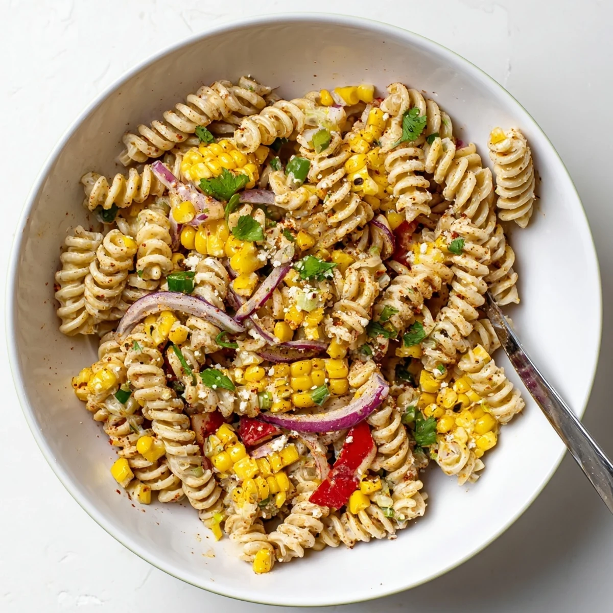 Bright Juicy Street Corn Pasta Salad with charred corn, cilantro, lime