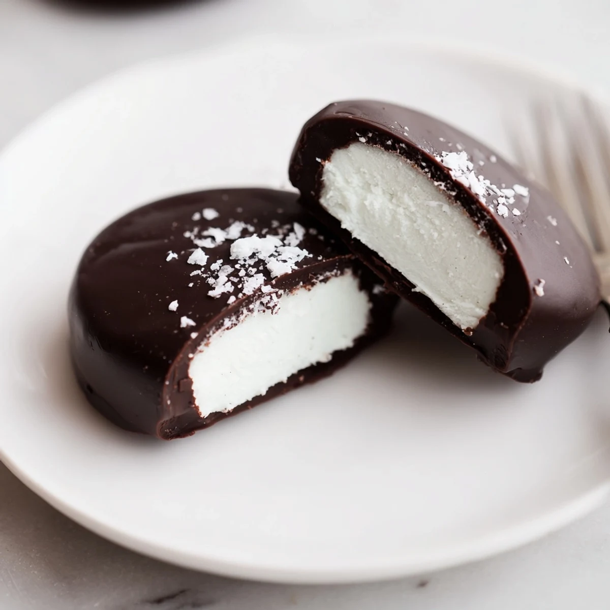 Stack of Peppermint Patties sprinkled with crushed candy, ready for gifting.